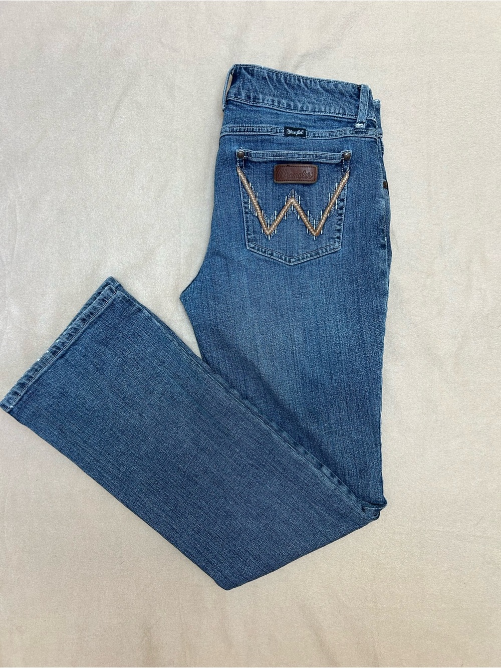 Wrangler Blue Boot Cut Jeans with Embroidered Back Pocket
